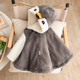 Pinguin-Poncho für Babys